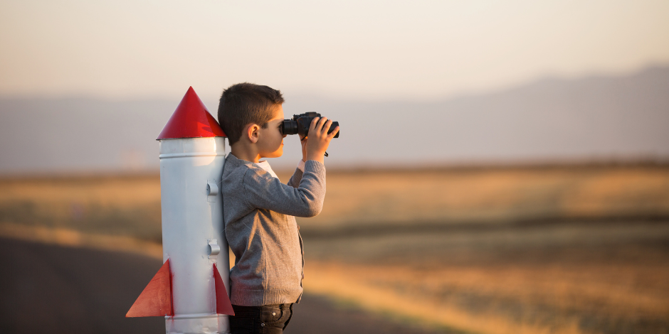 Boy with binoculars (YouthView Report)